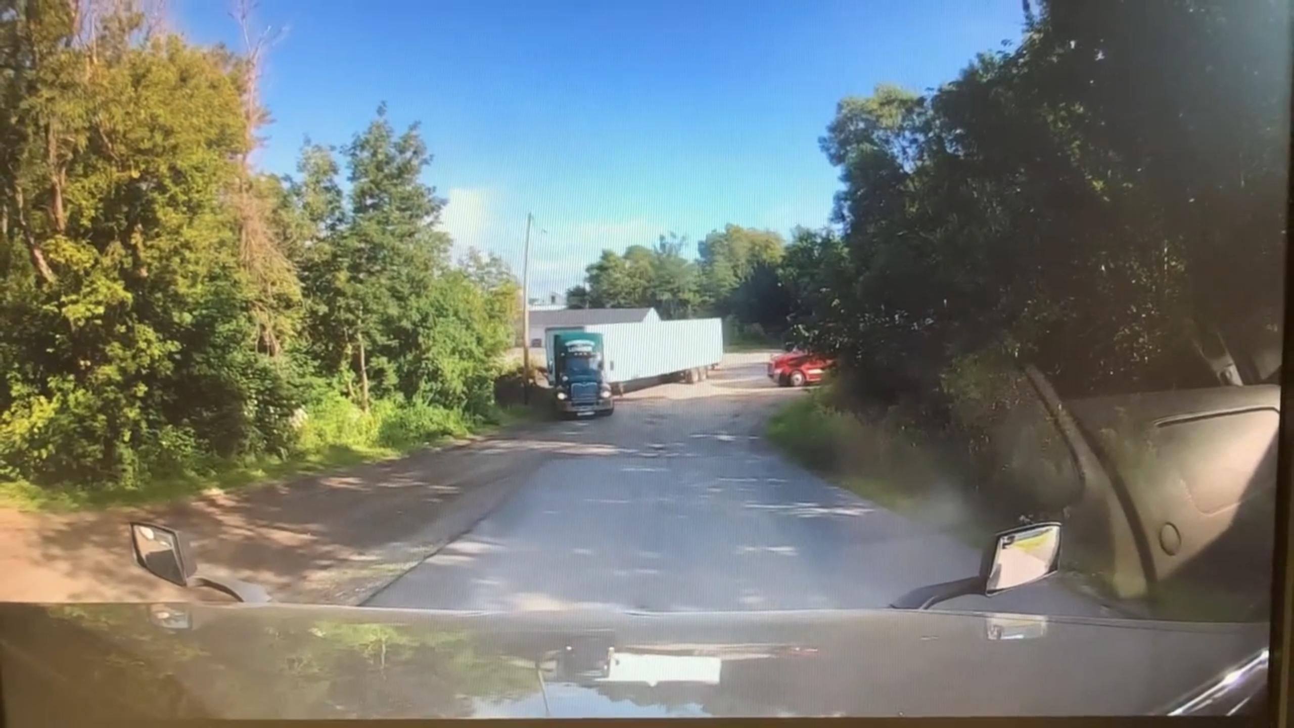 Truck driver saves himself and his lunch from wrong way driver